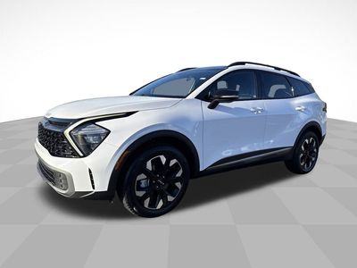 2023 Kia Sportage X-Line in White — front three-quarter view