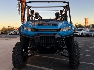2025 Honda Pioneer 1000-5 Deluxe in TEAL BLUE — front three-quarter view