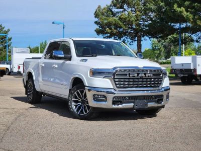 2025 RAM 1500 Limited Longhorn Crew Cab 4x4 5'7' Box in Bright White Clearcoat — front three-quarter view