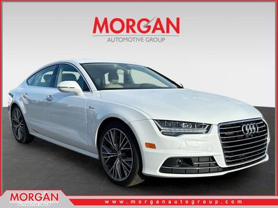 2018 Audi A7 Prestige in Glacier White Metallic — front three-quarter view