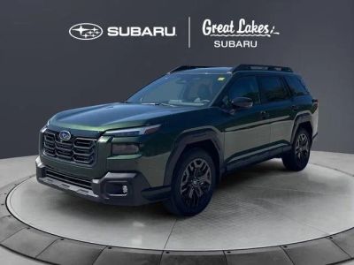 2026 Subaru OUTBACK Limited XT in Deep Emerald Green Pearl — front three-quarter view