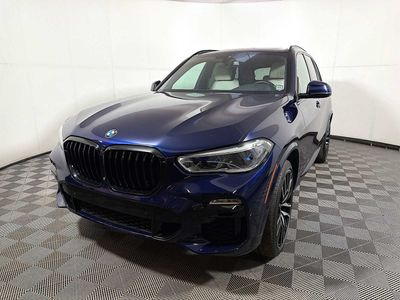 2021 BMW X5 M50i — rear three-quarter view