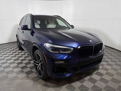 2021 BMW X5 M50i — side profile view