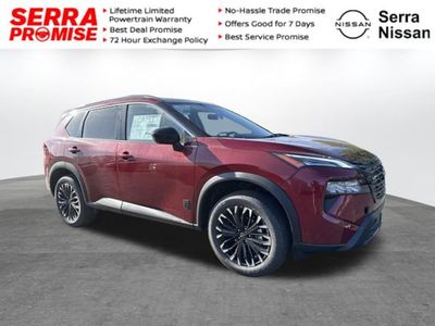 2026 Nissan Rogue Dark Armor in Scarlet Ember Tintcoat — front three-quarter view