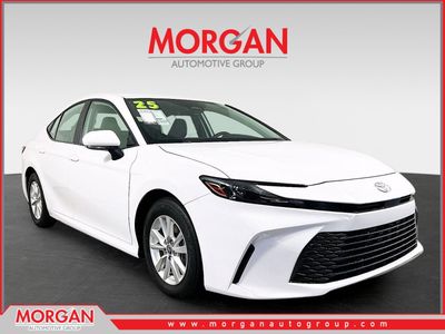 2025 Toyota Camry LE in White — front three-quarter view