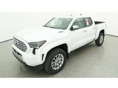 2026 Toyota Tacoma 4WD Limited Hybrid in Wind Chill Prl — front three-quarter view
