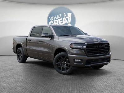 2026 RAM 1500 Laramie in Granite Crystal Metallic Clear-Coat Exterior Paint — front three-quarter view