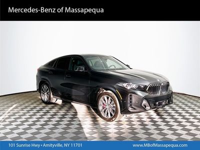 2024 BMW X6 xDrive40i in Black — front three-quarter view