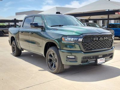 2026 RAM 1500 Big Horn/Lone Star in Serrano Green Metallic — front three-quarter view