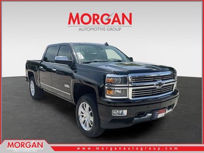2015 Chevrolet Silverado 1500 High Country in Black — front three-quarter view
