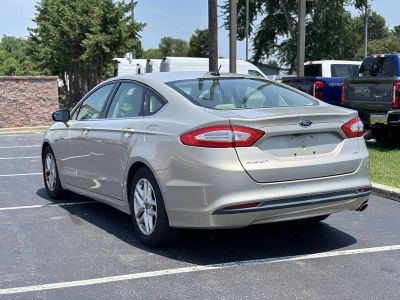 2015 Ford Fusion — rear three-quarter view