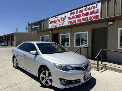 2014 Toyota Camry in Silver — front three-quarter view