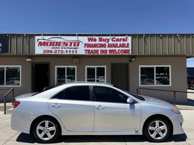 2014 Toyota Camry — side profile view