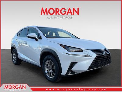 2021 Lexus NX 300 in Eminent White Pearl — front three-quarter view