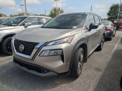 2021 Nissan Rogue SL in Gold — front three-quarter view