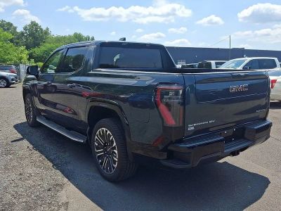 2026 GMC Sierra EV — rear three-quarter view