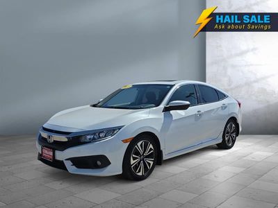 2018 Honda Civic Sedan — front three-quarter view
