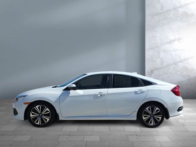 2018 Honda Civic Sedan — rear three-quarter view
