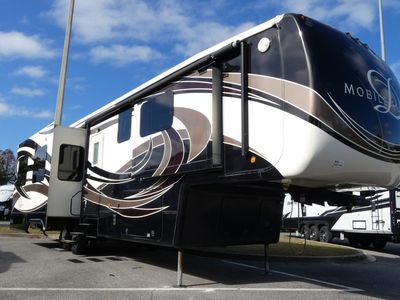 2015 DRV Luxury Suites Mobile Suites — front three-quarter view