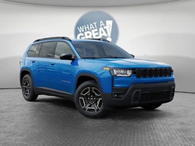 2026 Jeep Cherokee Laredo in Hydro Blue Pearl-Coat Exterior Paint — front three-quarter view