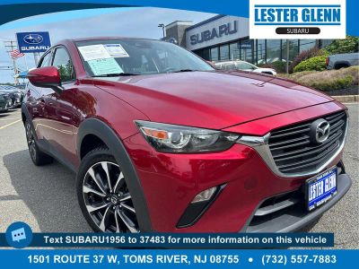 2019 Mazda Mazda CX-3 Touring in Soul Red Crystal Metallic — front three-quarter view