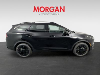 2026 Kia Sportage Hybrid — side profile view