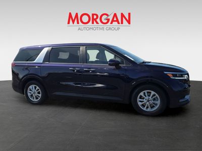 2024 Kia Carnival — side profile view