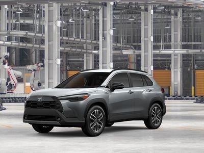2026 Toyota Corolla Cross XLE in Sonic Silver — front three-quarter view