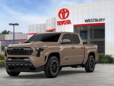 2026 Toyota Tacoma TRD Sport in Mudbath — front three-quarter view