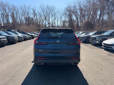 2023 Honda CR-V Hybrid Sport Touring — engine compartment view