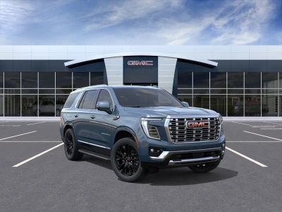 2026 GMC Yukon Denali in Downpour Metallic — front three-quarter view