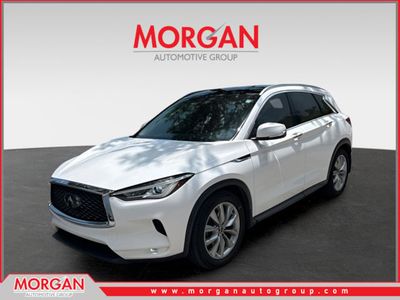 2020 INFINITI QX50 LUXE in White — front three-quarter view