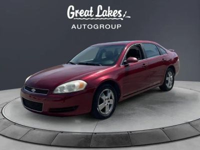 2008 Chevrolet Impala LT in Red Jewel Tintcoat — front three-quarter view