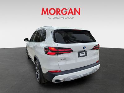 2026 BMW X5 — rear three-quarter view