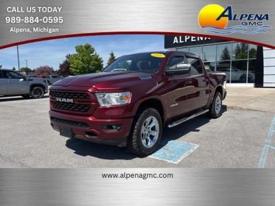 2022 RAM 1500 Big Horn Crew Cab 4x4 5'7" Box in Red — front three-quarter view