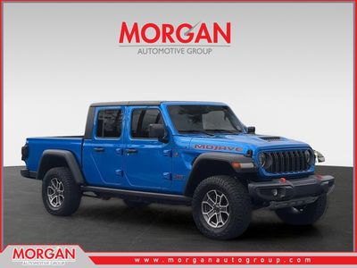 2024 Jeep Gladiator Mojave in Blue — front three-quarter view