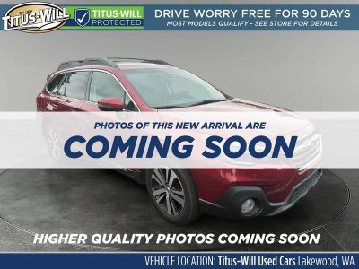 2019 Subaru Outback 3.6R Limited in Crimson Red Pearl — front three-quarter view