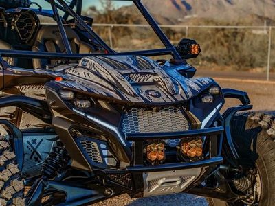 2026 Can-Am Maverick R X RS Triple Black — rear three-quarter view