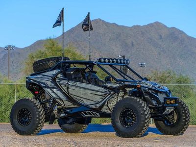 2026 Can-Am Maverick R X RS Triple Black — front three-quarter view