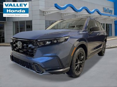 2026 Honda CR-V Hybrid Sport-L in Canyon River Blue Metallic — front three-quarter view