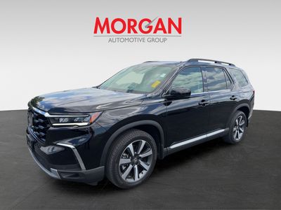 2024 Honda Pilot — rear three-quarter view