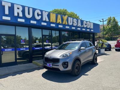 2017 Kia Sportage in Silver — front three-quarter view