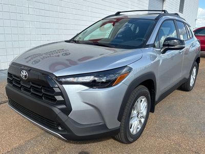 2026 Toyota Corolla Cross LE in Sonic Silver — front three-quarter view
