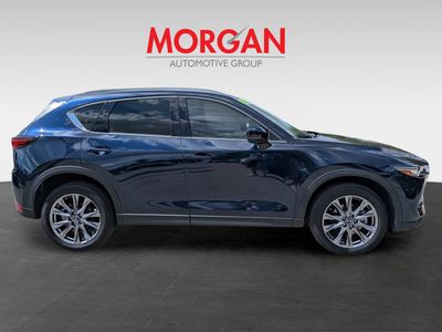 2021 Mazda CX-5 — rear three-quarter view