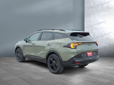 2026 Kia Sportage Plug-In Hybrid — rear three-quarter view