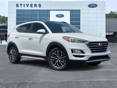 2019 Hyundai Tucson Ultimate in White — front three-quarter view