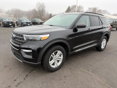 2023 Ford Explorer XLT 4WD in Agate Black Metallic — front three-quarter view