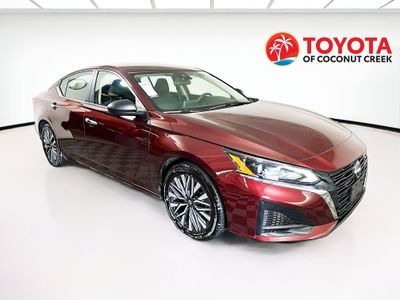 2024 Nissan Altima 2.5 SV in Garnet Pearl Metallic — front three-quarter view
