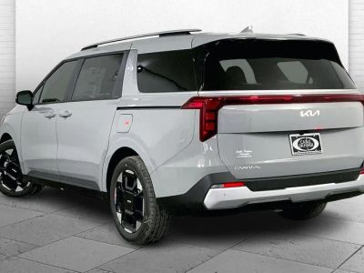 2026 Kia Carnival — rear three-quarter view