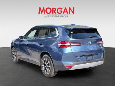 2026 BMW X3 — rear three-quarter view